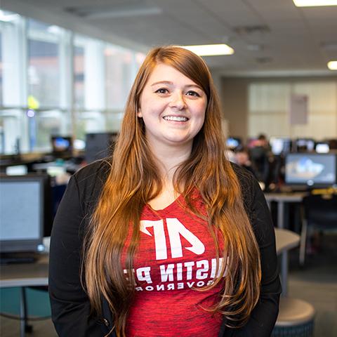 Robyn Yates poses in Maynard Math and Science building